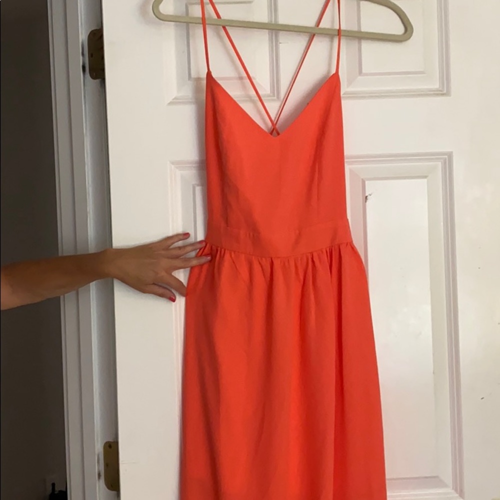 Long coral dress tags on